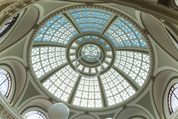 Historic steel and glass arched dome and skylight in a San Francisco shopping mall