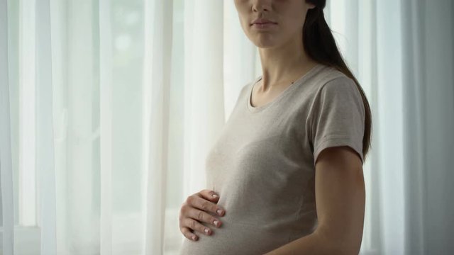 Bruised pregnant woman found protection in shelter for domestic violence victims