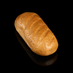 Loaf of bread on black
