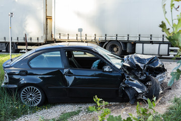 Car after frontal collision with a truck  in Latvia on the road