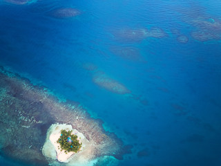 Blue sea water with coral reefs