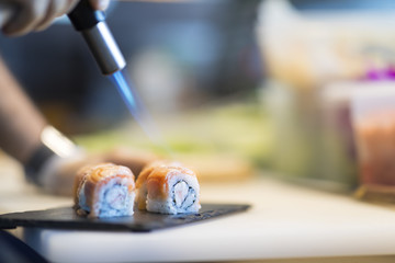 Sushi preparation in japanese restaurant