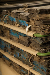 Veneered oak veneer folded into piles in the basement.