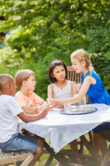 Group of kids drink water