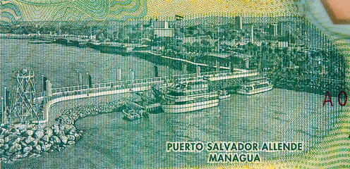 Port of Salvador Allende in Managua on Nicaragua 10 cordobas (2015) banknote closeup, Nicaraguan money close up