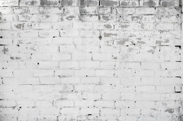 White brick wall background. Grunge weathered texture.