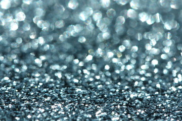 Blue glitter background. Christmas, New Year, party or festive background.
