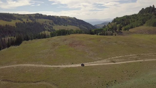 drone flying across canyon looking at an ATV