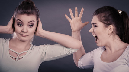 Two women having argue