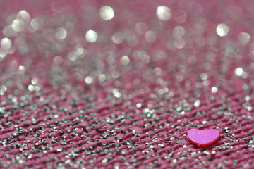 Glitter background with heart.