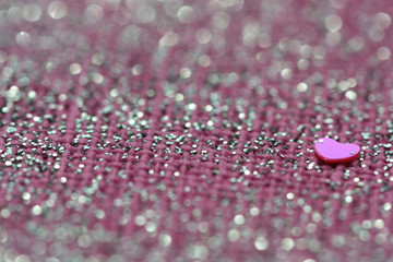Glitter background with heart.