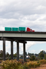 Obraz premium Everett, WAshington / USA - 08/30/2018: Truck with pipes driving northbound on I5 freeway