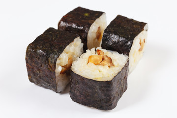 Portion of sushi with unagi and mushrooms on a white background close up.