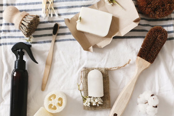 zero waste concept, flat lay of plastic free items. natural luffa, bamboo toothbrush, brush,...