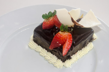 Chocolate Cake decorated with strawberries