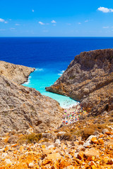 Scenic view on the exotic Stefanou beach (Seitan Limania) Akrotiri. Rocky beach with white sand and azure water. Stunning natural landscape. Island of Crete. Chania. Greece.
