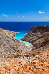 Scenic view on the exotic Stefanou beach (Seitan Limania) Akrotiri. Rocky beach with white sand and azure water. Stunning natural landscape. Island of Crete. Chania. Greece.
