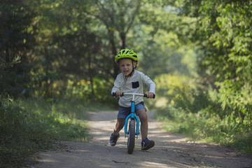 Young boy on balance bike
