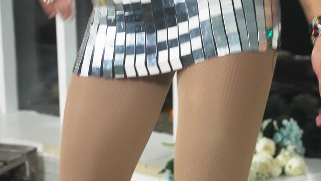 travesty-diva. The concept of the transvestite show. Man-actor turns into a woman. he dances, sings and poses on camera. 4k, slow motion, shooting steadicam