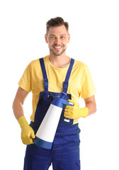 Male janitor with spray bottle of cleaning product on white background