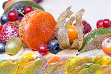 Fototapeta na wymiar Details decorative fruit cake with marshmallow, close up.