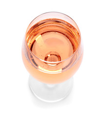Glass of rose champagne on white background. Festive drink