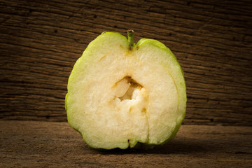guava fruit on wood
