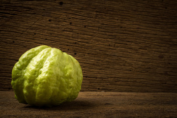 guava fruit on wood