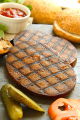 prepared vegan seitan burger meal