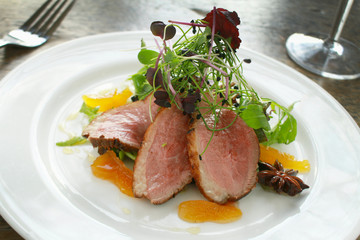 plated pan fried duck meal