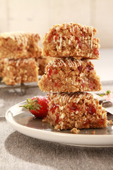 home baked oat traybakes with strawberry jam