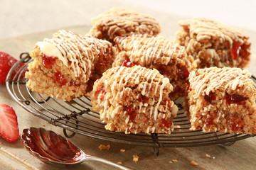 home baked oat traybakes with strawberry jam