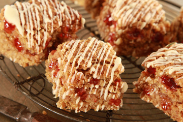 home baked oat traybakes with strawberry jam