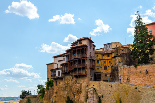 Beautiful cityscape of the picturesque Hanged Houses (Casas Colgadas) in Cuenca, Spain. Curious houses built on the rocks of a cliff.