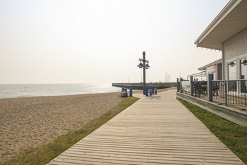 Peaceful lake beach view. Beautiful summer holiday.