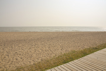 Peaceful lake beach view. Beautiful summer holiday.