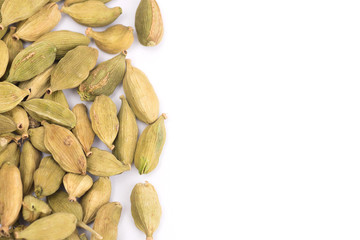 Pile of green Cardamom, cardamon or cardamum  isolated on white background (dried fruits of Elettaria cardamomum)
