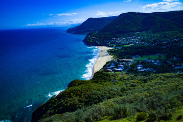 Fototapeta premium Stanwell Park, NSW, Australia – Drone photos of the park and coast near Coalcliff, New South Wales, Sydney, Australia on a spring day