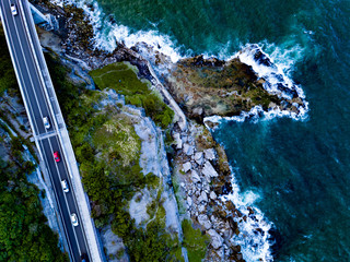 Seacliff Bridge, Coalcliff, NSW, Australia - Drone photos of the Seacliff bridge near Coalcliff, New South Wales, Sydney, Australia on a spring day © Hermosa Drones