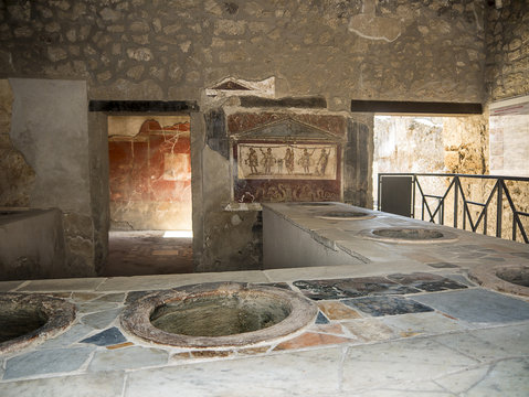 Shop or Bar in the once buried Roman city of Pompeii south of Naples under the shadow of Mount Vesuvius
