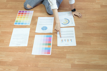 Businesswoman in office in casual shirt. Check document color template for graphic designer and choose sample to match the publication.