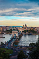Fototapeta premium Panoramic view of the Széchenyi Chain Bridge during sunset from the Budapest castle in Hungary