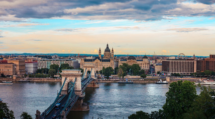 Fototapeta na wymiar Panoramic view of Budapest during sunset. Széchenyi Chain Bridge and Danube river