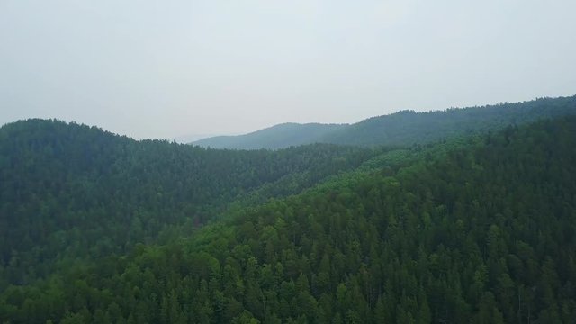 Beautiful colorful landscape at Krasnoyarsk stolby misty day drone footage