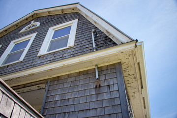 Damaged home needing repair and construction