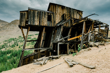 Fototapeta na wymiar Historic Mill at High Elevation in Colorado on Stormy Day