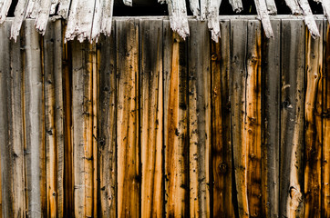 Weathered wooden wall of old Colorado mine - 220724374