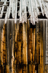 Weathered wooden wall of old Colorado mine - 220724399