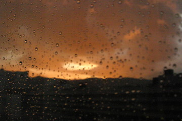 Texture detail of rain drop in window.