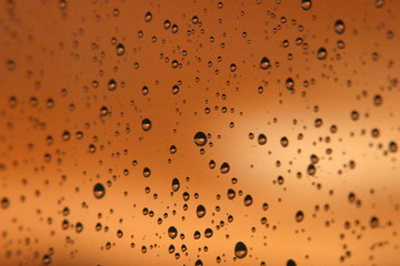Texture detail of rain drop in window.